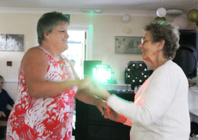 Staff and residents enjoying a disco at Bromley Park 5