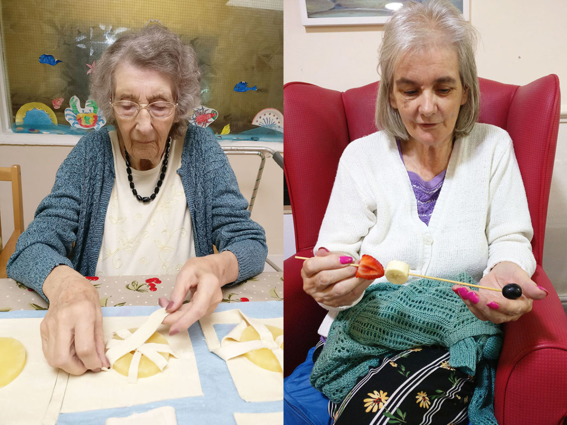 Lady residents making pineapple tarts and fruit kebabs at Lulworth House