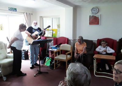 Folk singers entertain residents at Luworth House
