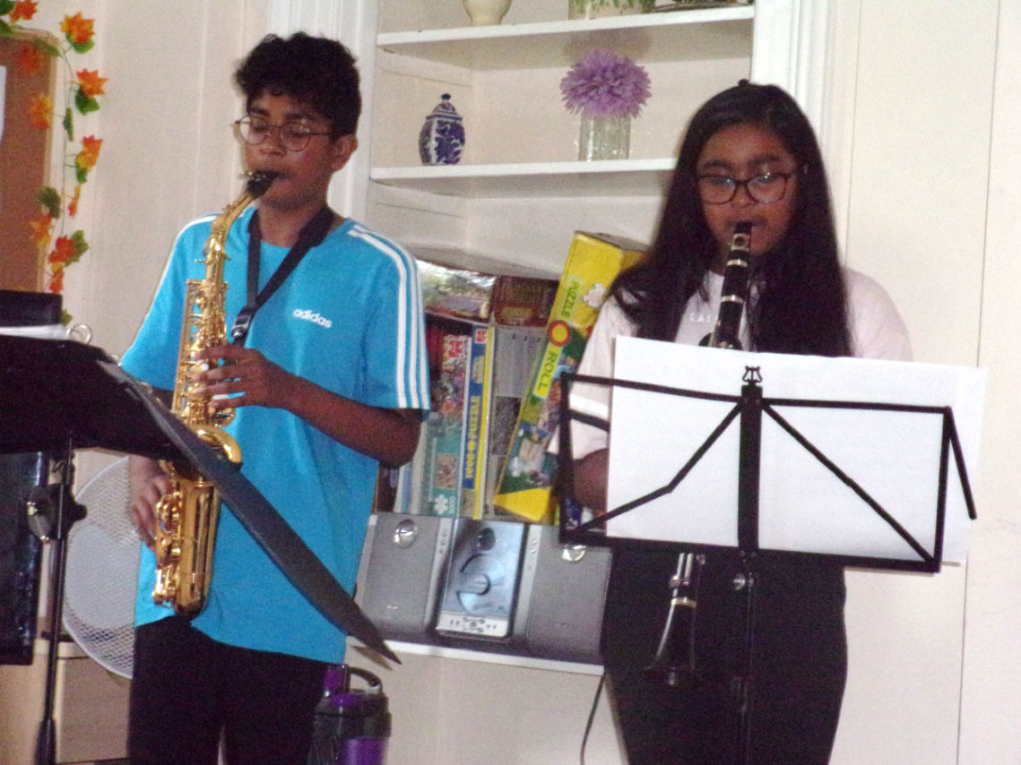 Kamren and Lavinina Mendis performing at Loose Valley Care Home