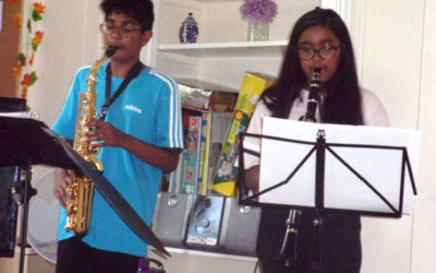Kamren and Lavinina Mendis performing at Loose Valley Care Home