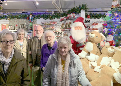 Lulworth residents at Notcutts Garden Centre by the Christmas decorations