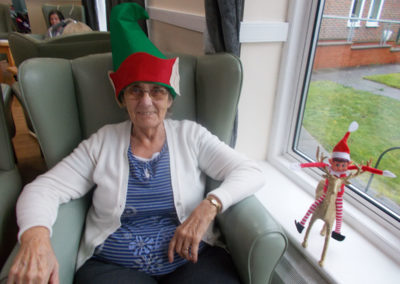 Sonya Lodge lady resident in an elf hat