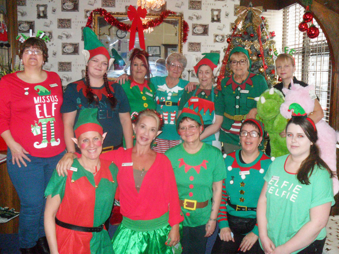 The staff team at Woodstock dressed up as Christmas elves
