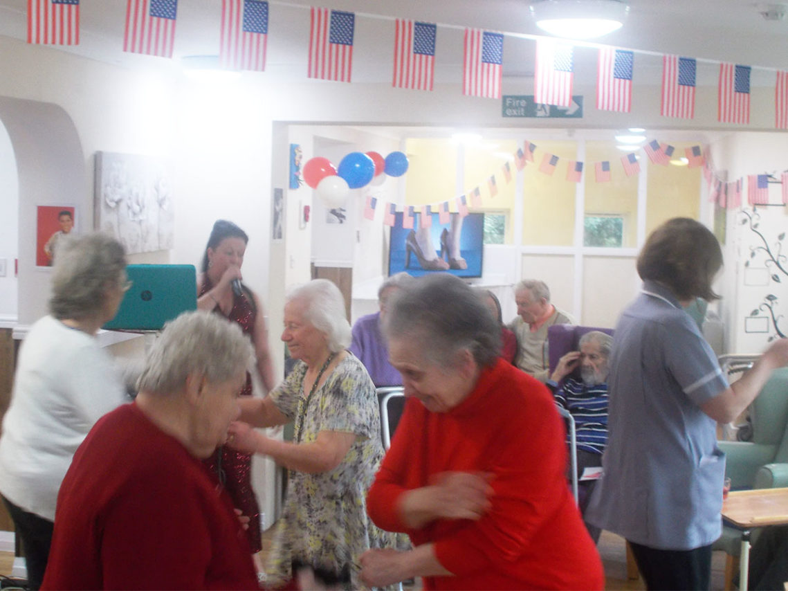 Sonya Lodge residents dancing to singer performing Elvis songs