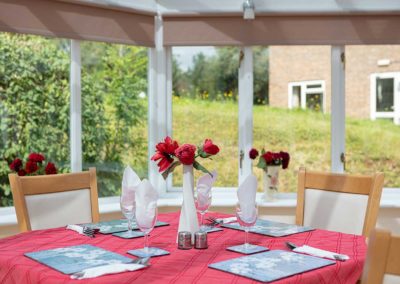 The conservatory dining room at Loose Valley Care Home