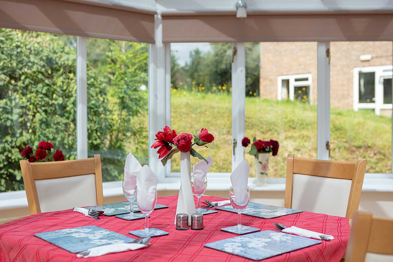 The conservatory dining room at Loose Valley Care Home