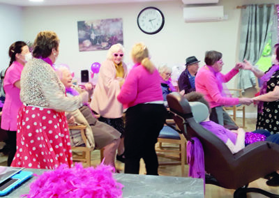 Pink ladies on the dance floor at Abbotsleigh Care Home