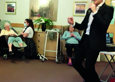 Singer Kevin Walsh performing 1950s tunes at Hengist Field Care Home